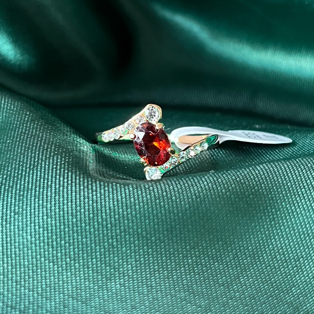 Gold Alloy Ring With Clear And Red Gems